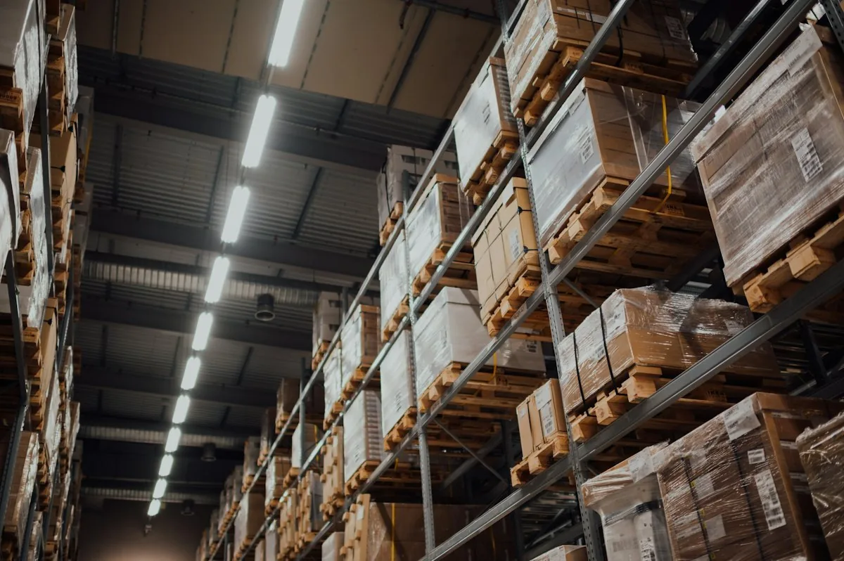 Stock and boxes stored on warehouse shelves